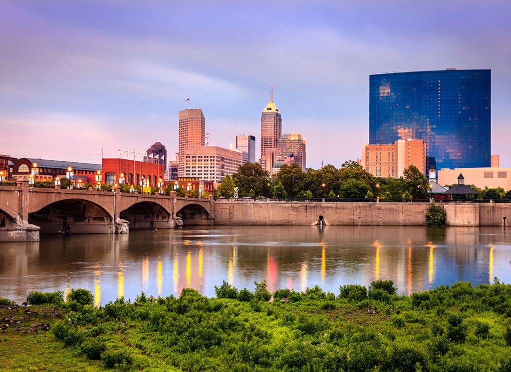 Insurance Companies - Indianapolis IN Bridge Water With Lights at Dusk
