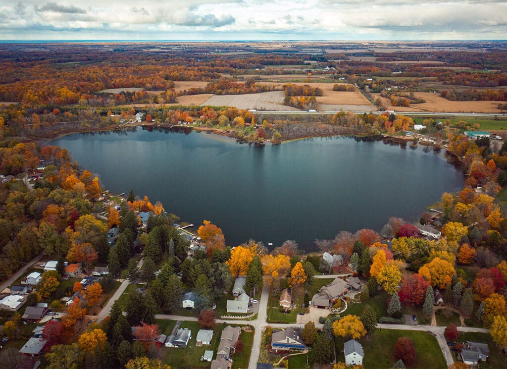 Are You Moving to Indiana - Heart Shaped Saugany Lake Indiana Surrounded By Residential Homes in Autumn
