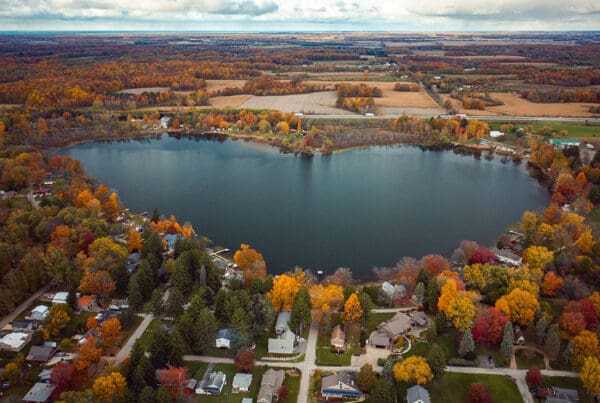 Are You Moving to Indiana - Heart Shaped Saugany Lake Indiana Surrounded By Residential Homes in Autumn