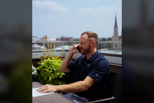 Moving to Indiana - Jackson Blevins Answering Phone Call Outdoors in Indiana